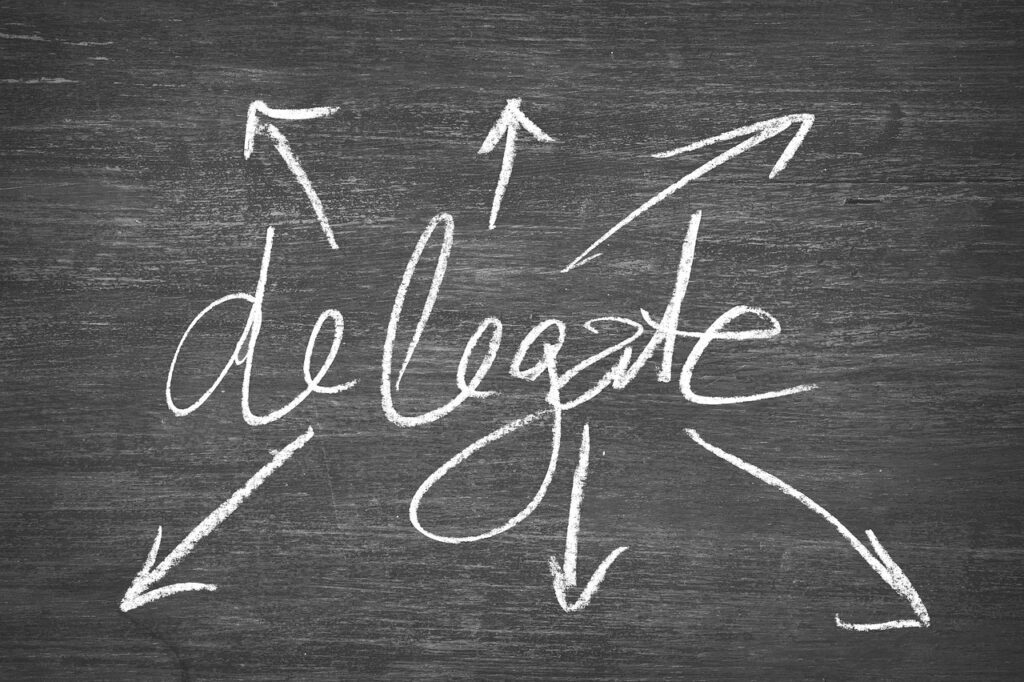delegate to the cavalry word on chalkboard
