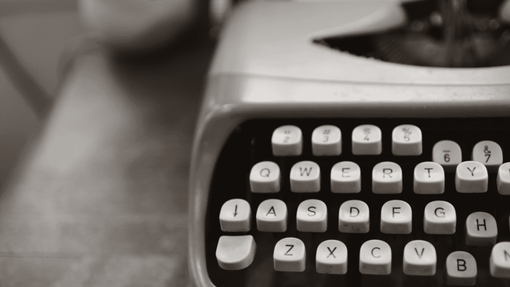 pay to publish black and white image of old typewriter