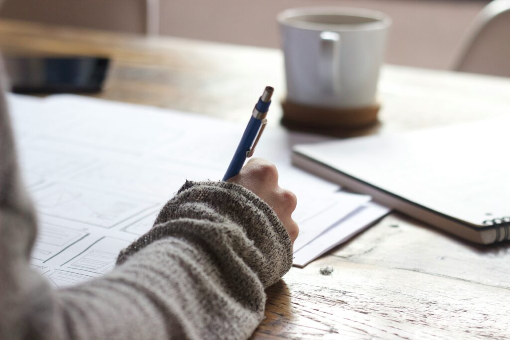 woman writing a book outline