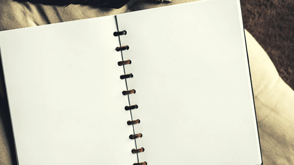 writing as a skill, notebook on a blanket